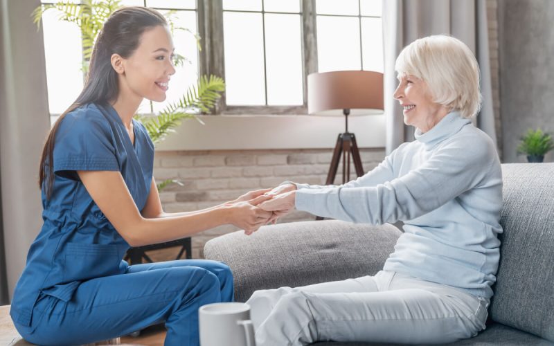 assisting-senior-people-female-caregiver-holding-2022-05-31-02-21-32-utc.jpg